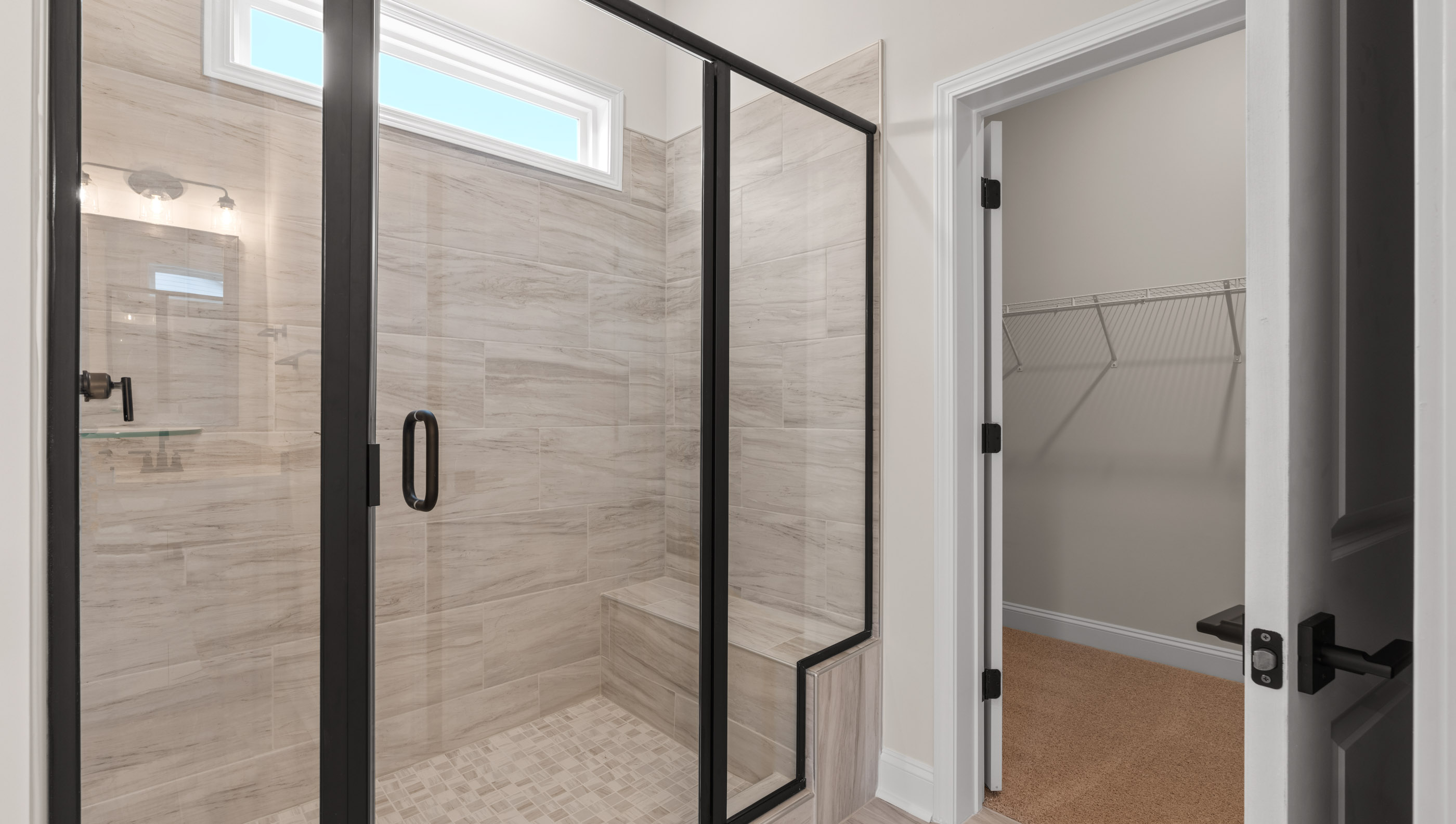 Bathroom with walk in shower.