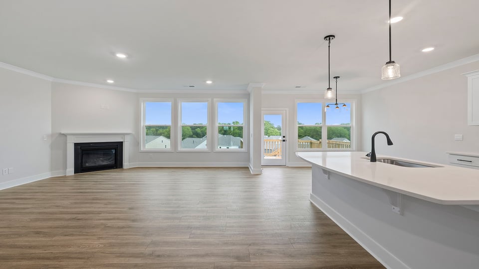 Kitchen with island and cabinets.