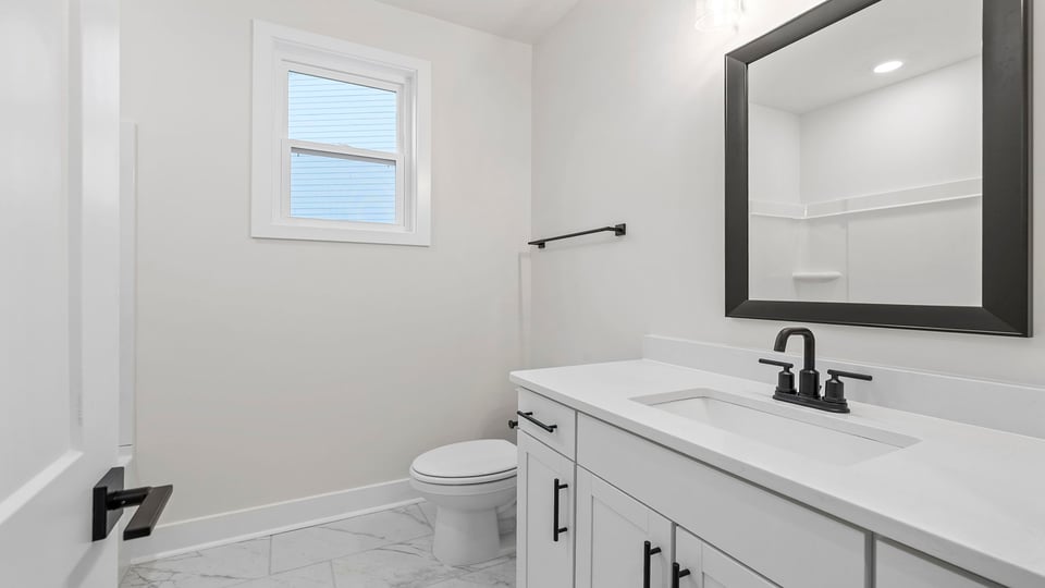 Bathroom with vanity sink.