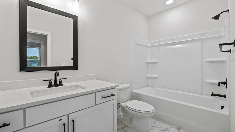 Bathroom with vanity sink.