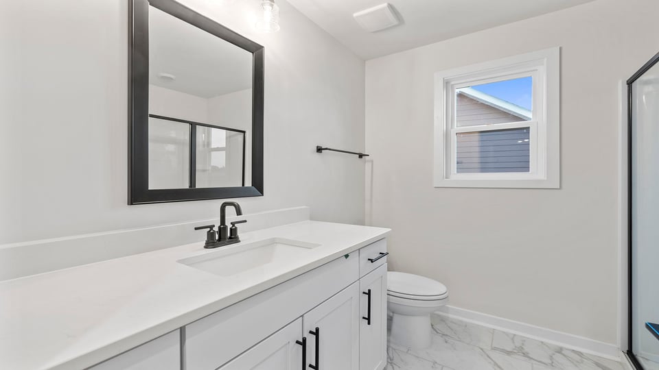 Bathroom with vanity sink.