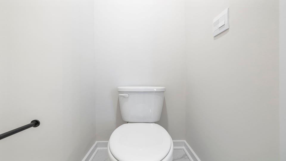 Primary bathroom with double vanity sinks.