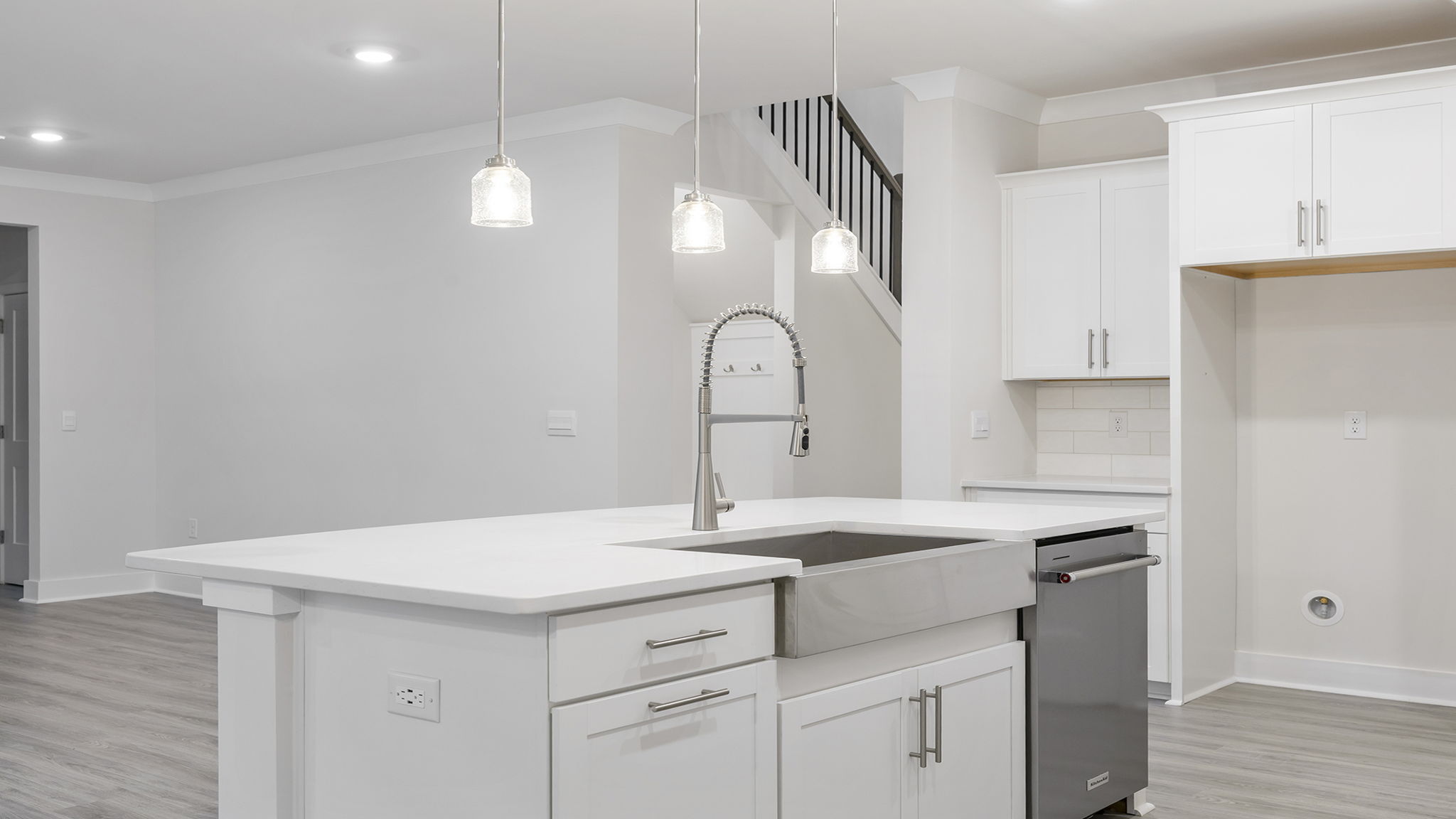 Island with sink and dishwasher.