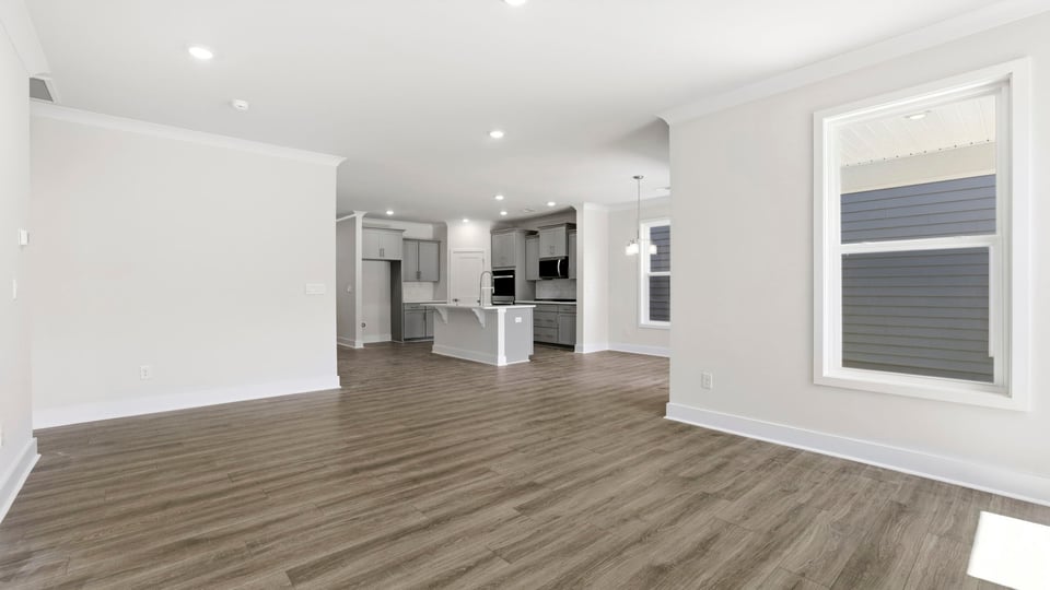 Living area with windows and fireplace.