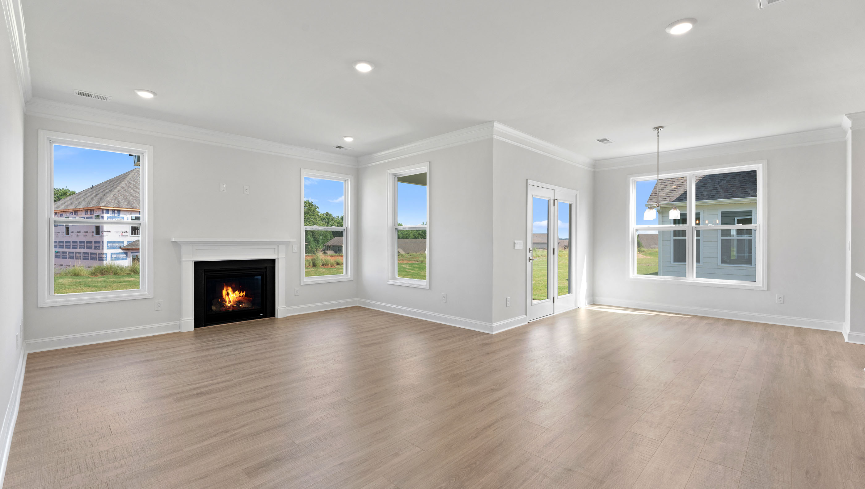 View of family room and breakfast area.