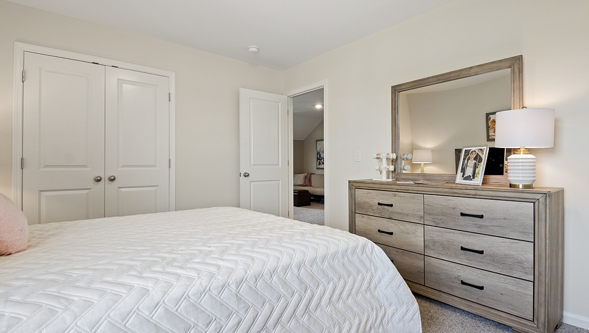 Bedroom with carpet.