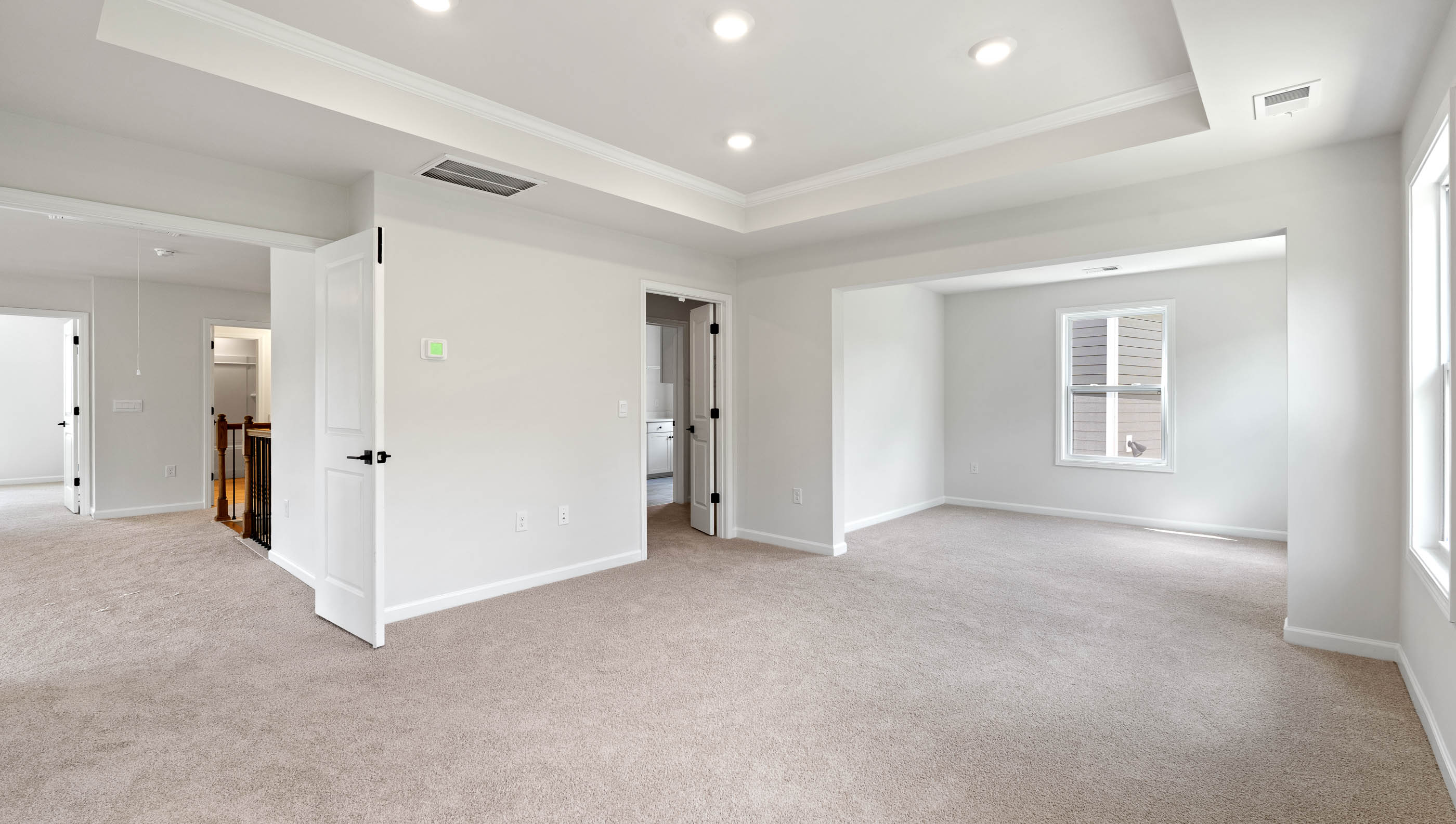View of sitting room off primary bedroom.