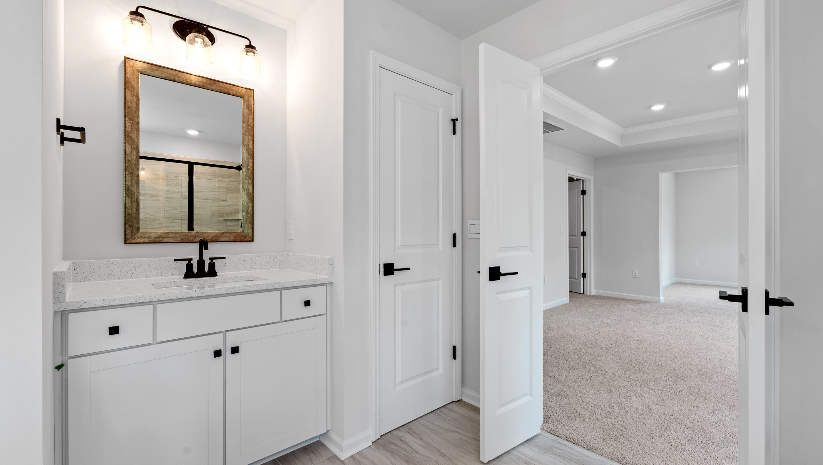 Primary bathroom dual vanities.