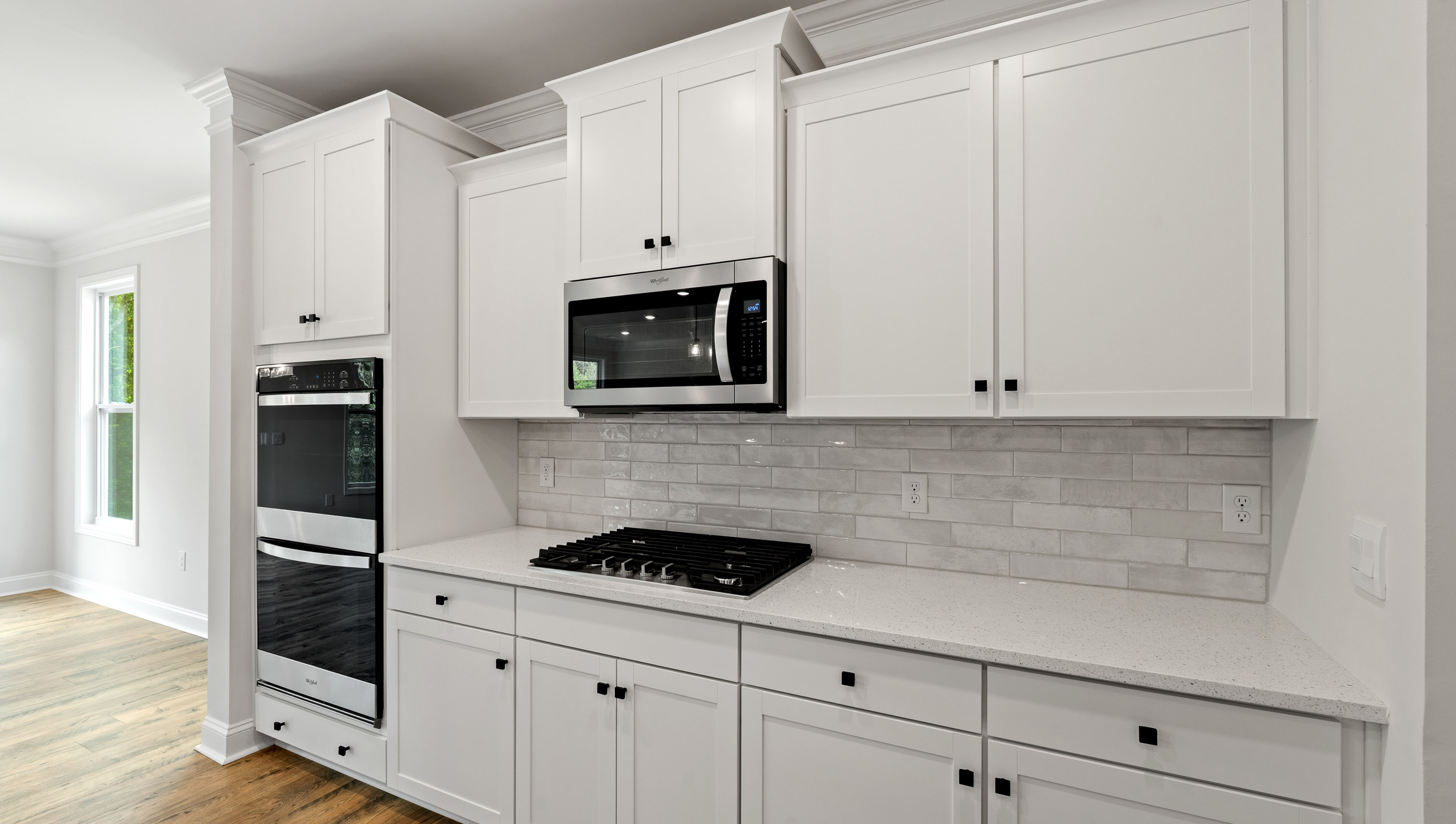 Kitchen with gas stove top.