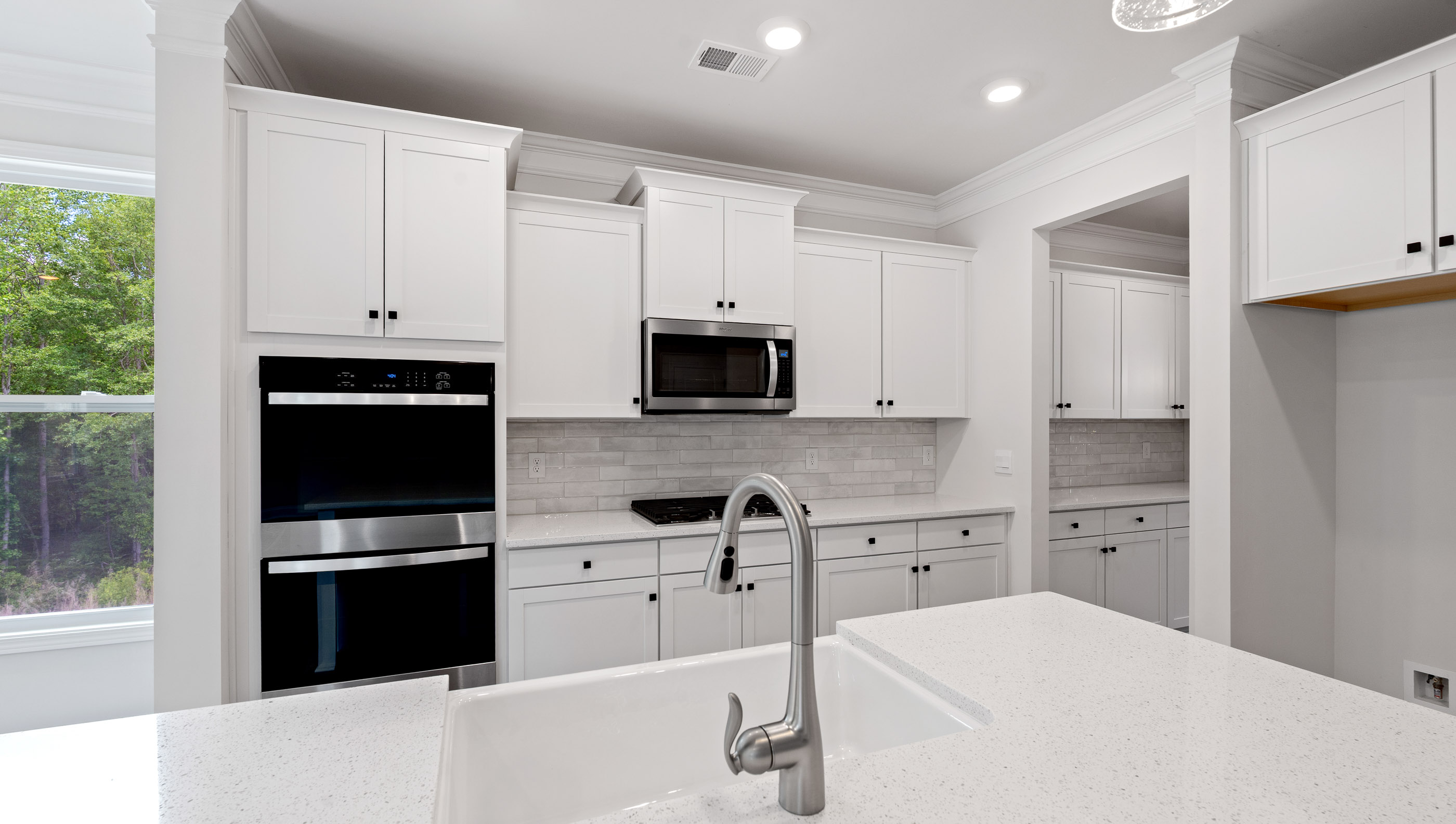 Kitchen with dual wall ovens.