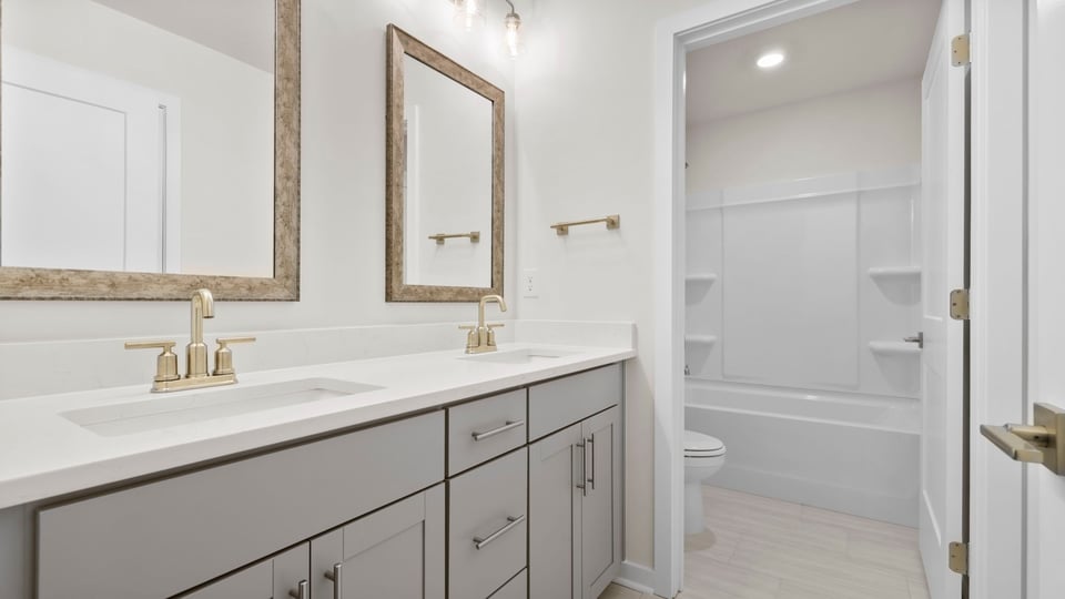 Bathroom with double vanity sinks.