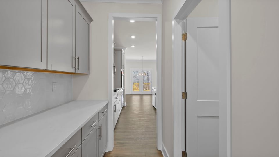Bulter's pantry with cabinets.