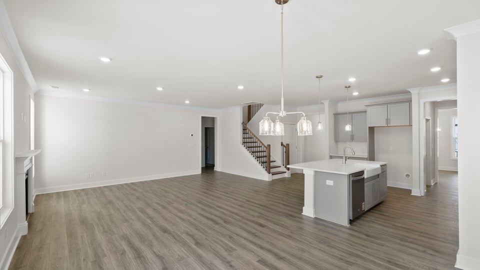 Kitchen with island and cabinets.