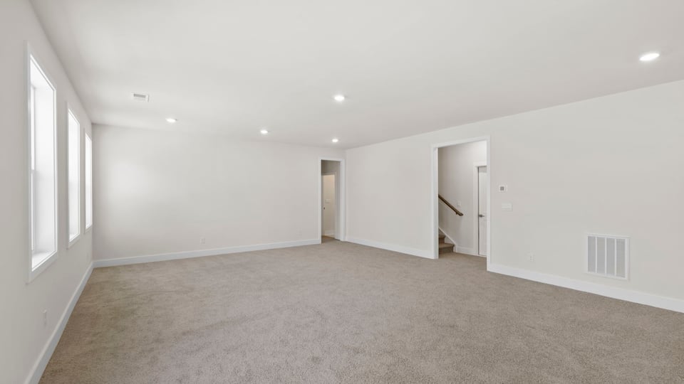 Finished basement with carpet.