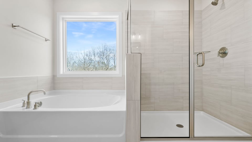 Primary bathroom with double vanirty sinks.