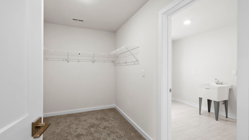 Laundry room with window.