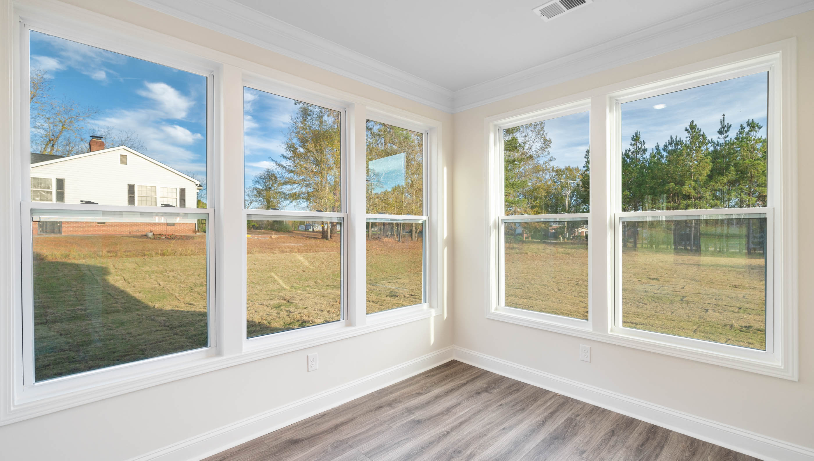 Study at front of home with windows.