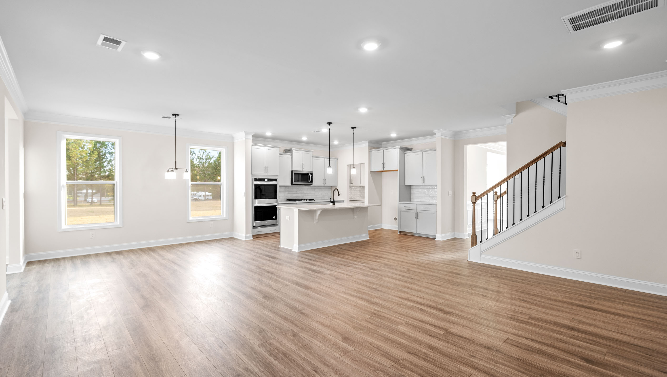 Family room with view of kitchen.