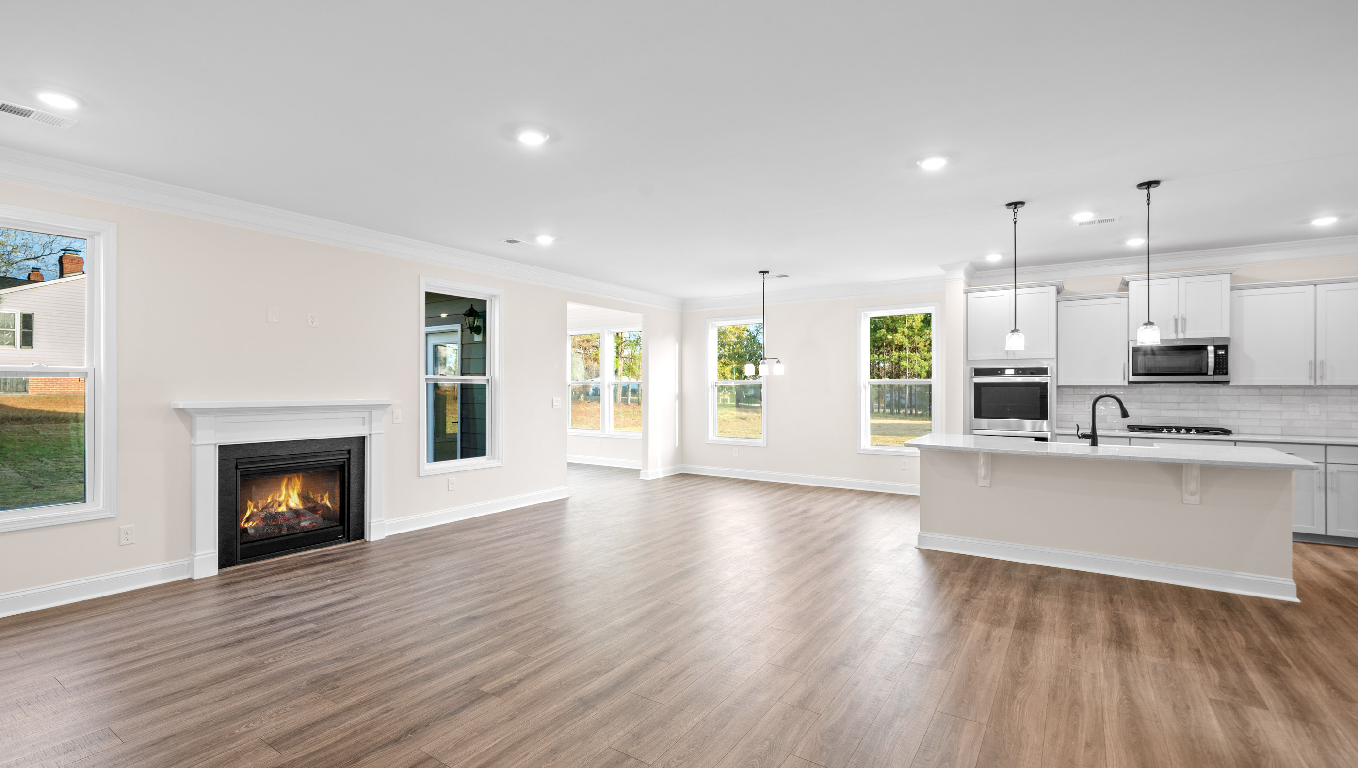 Family room with view of kitchen.