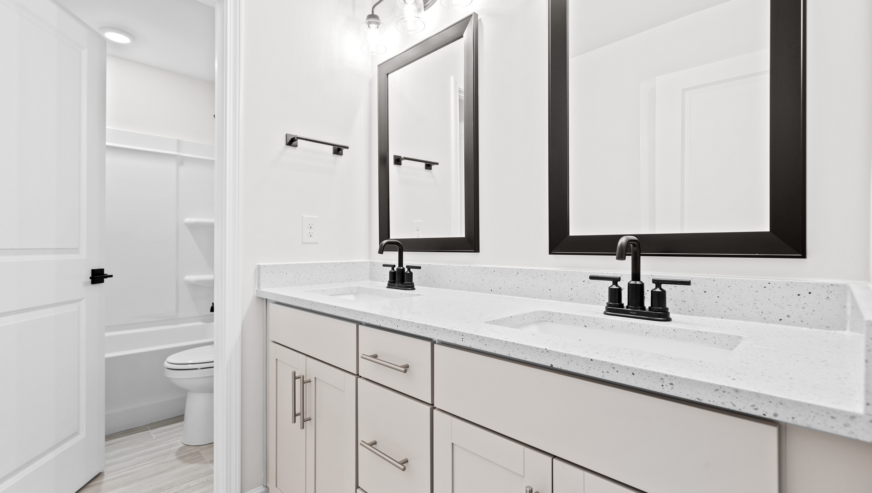 Bathroom with double vanity sink.