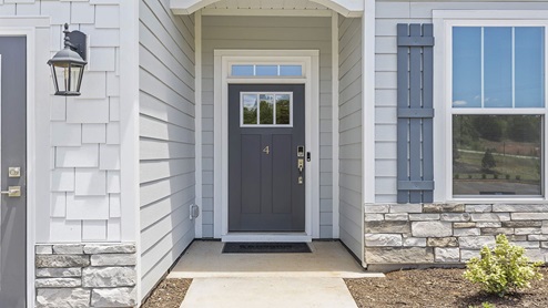 Front exterior of Azalea with 2 car garage.
