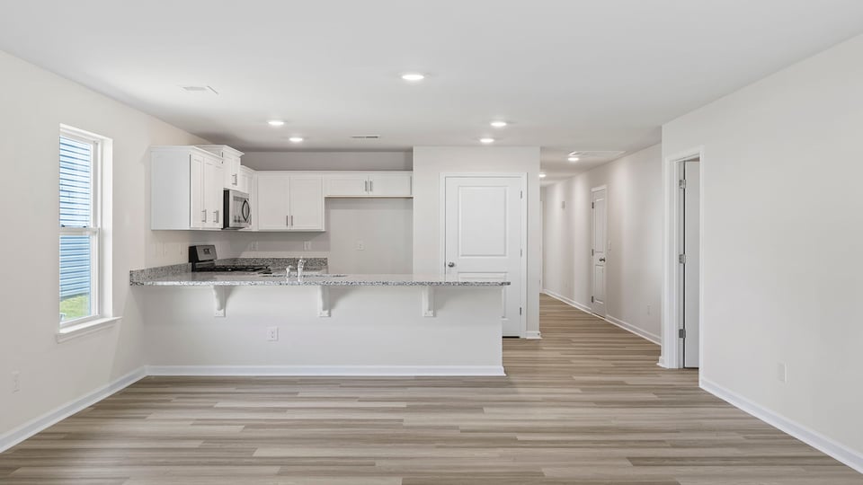 Kitchen with windows.