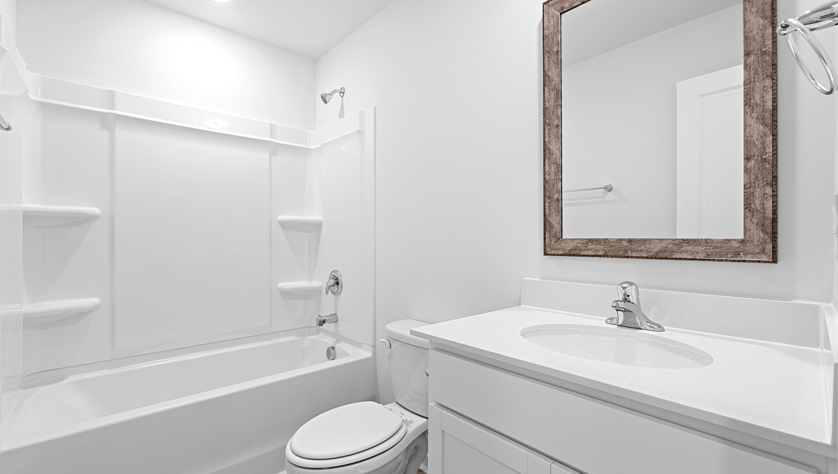 Bathroom with vanity and tub.