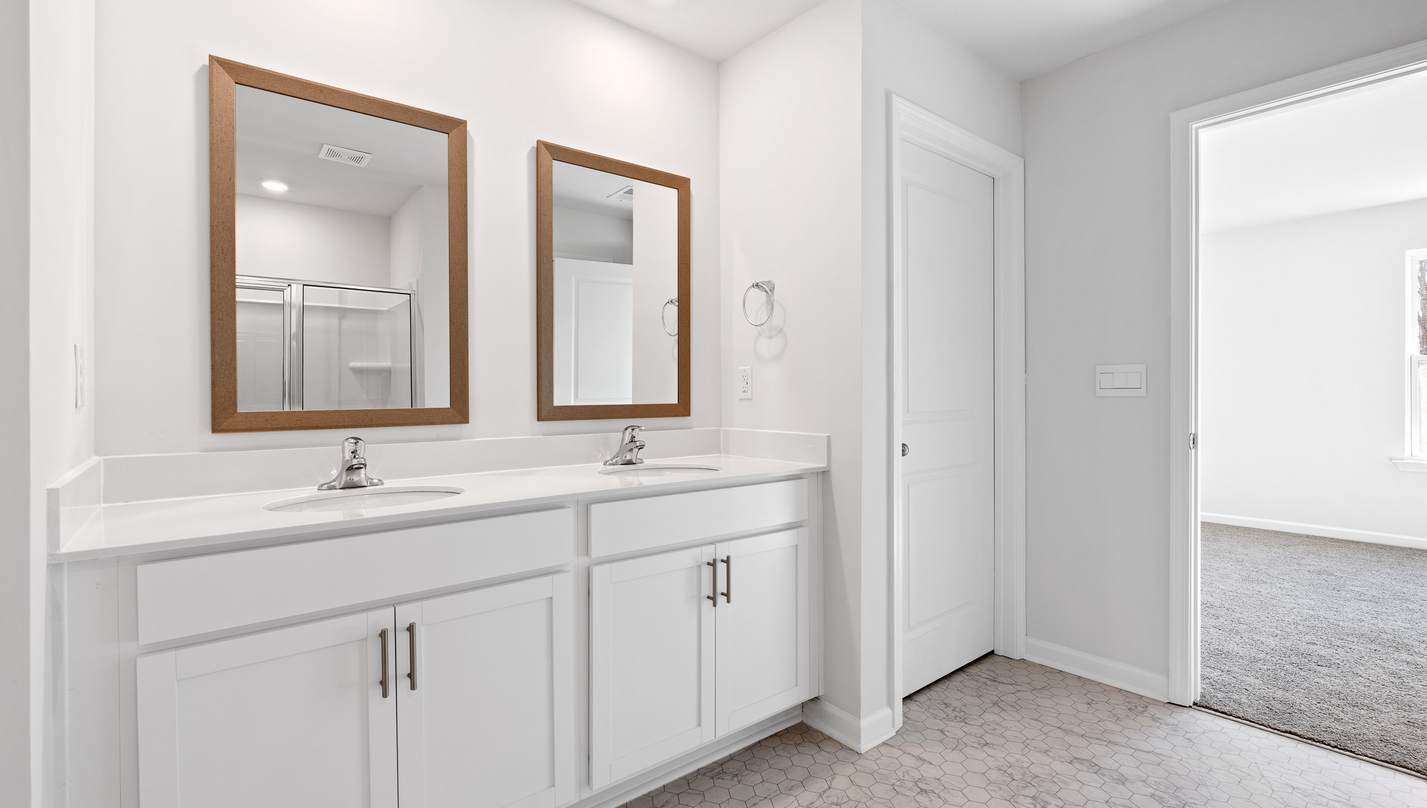 Bathroom with shower and vanity.