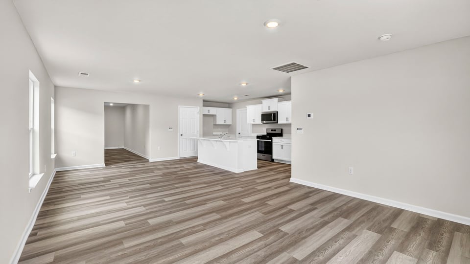 Fireplace and window in living area