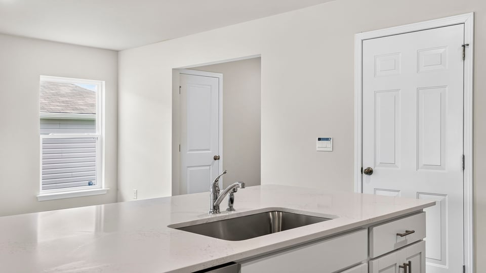 Close up of island/sink and living area