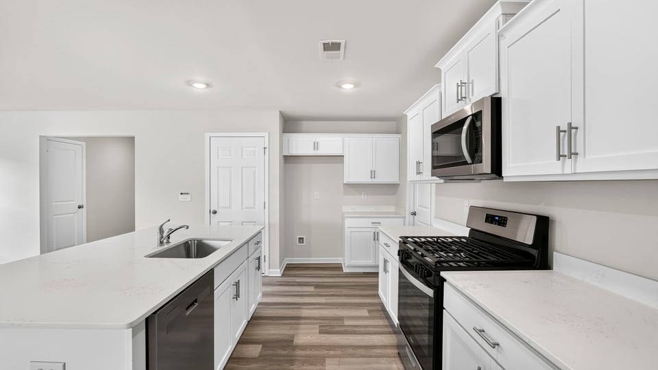 Side view of full kitchen