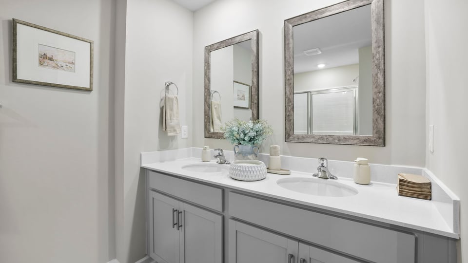 Bathroom with double vanity sink.