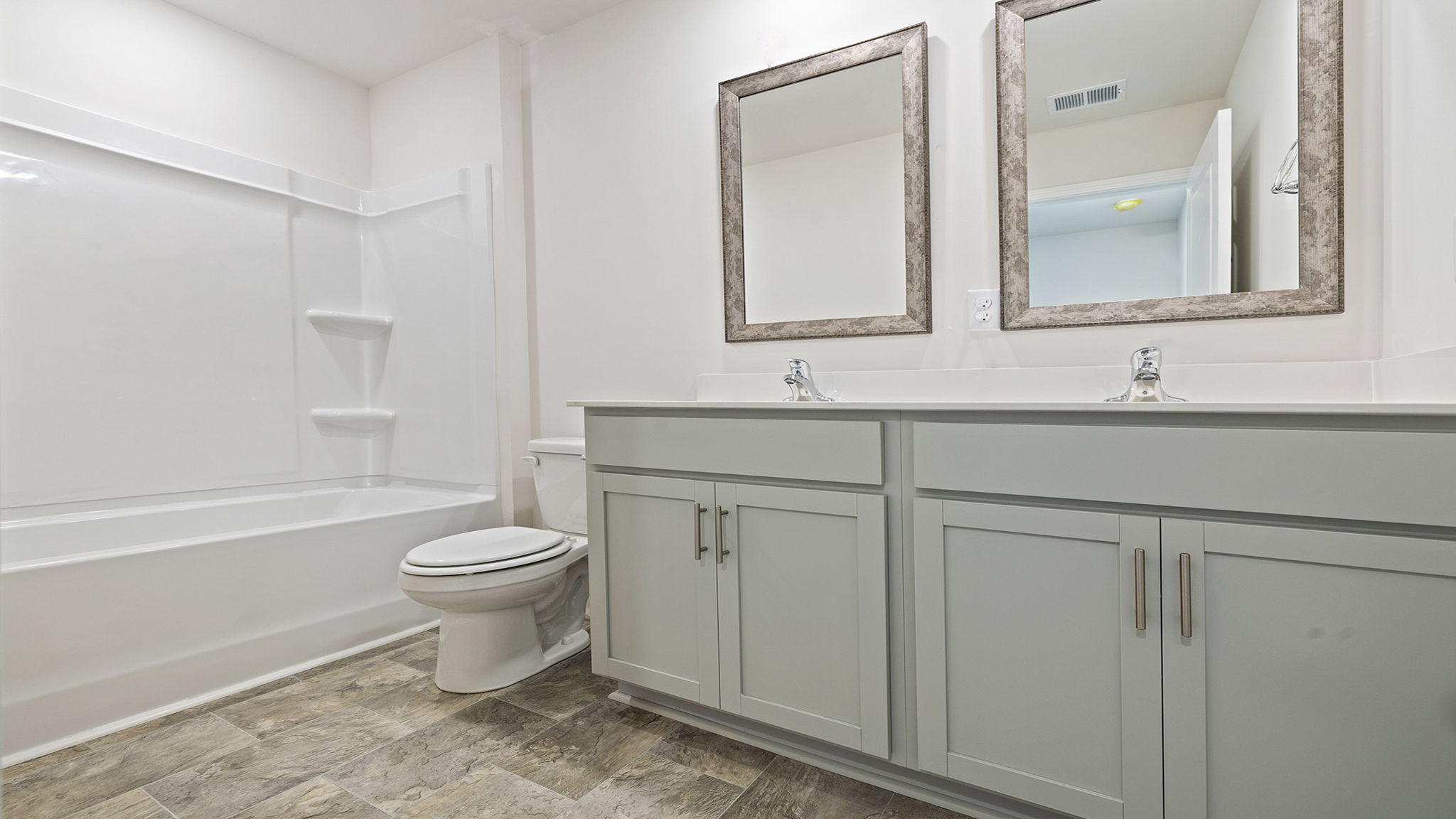 Bathroom with vanity and tub.
