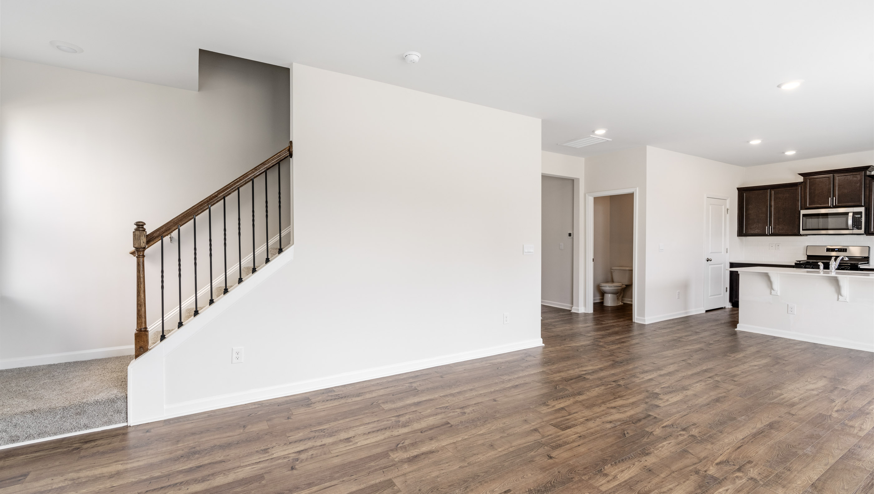 Great room with stairs to second level.