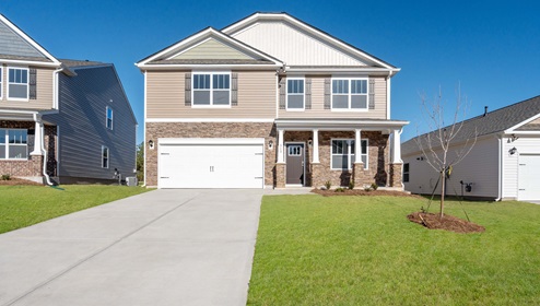 Front exterior of Wilmington with two car garage.