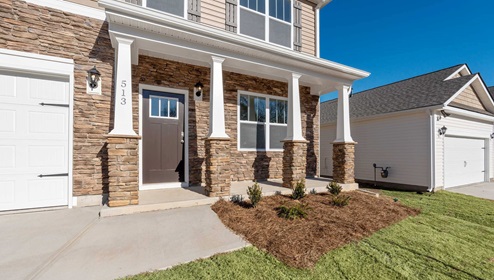Front exterior of Wilmington with two car garage.