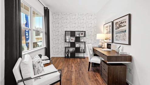 Office at front of home with windows.