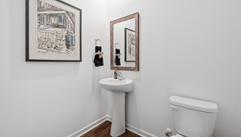 Bathroom with toilet and sink.