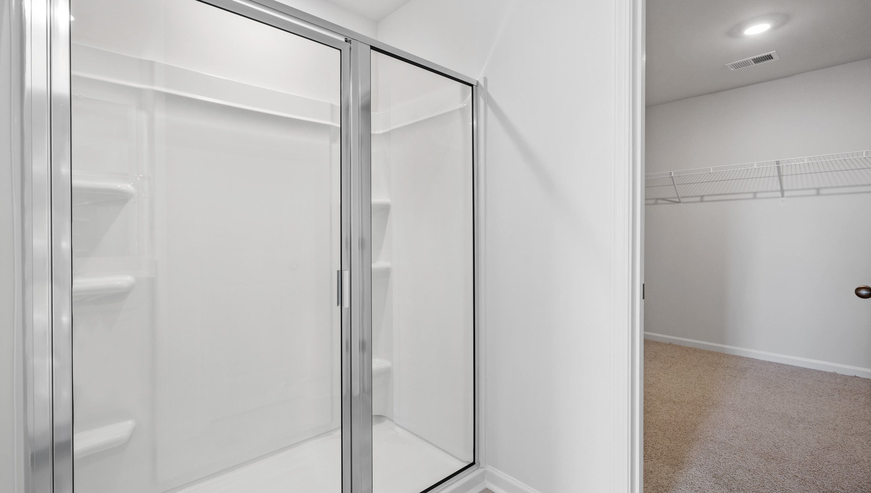 Bathroom with walk in shower.