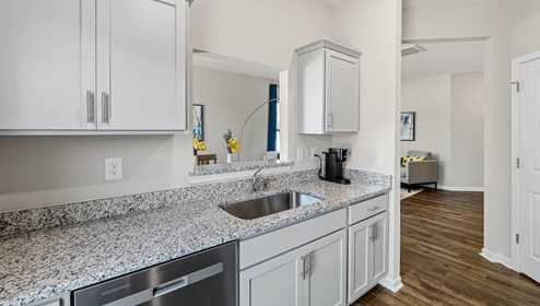 Kitchen with granite counter tops.