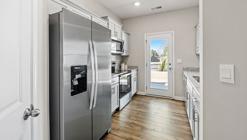 Kithcen with stainless steel appliances.