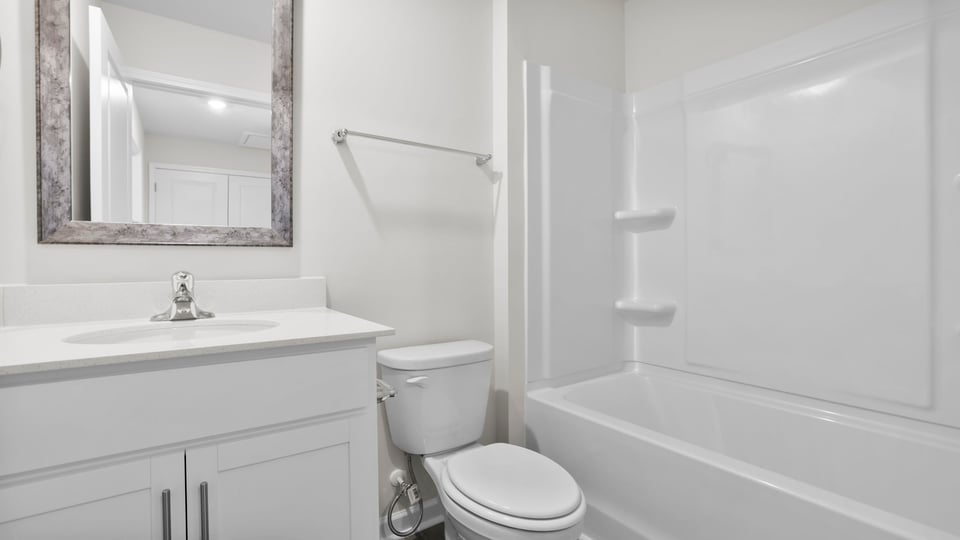 Bathroom with vanity and sink.