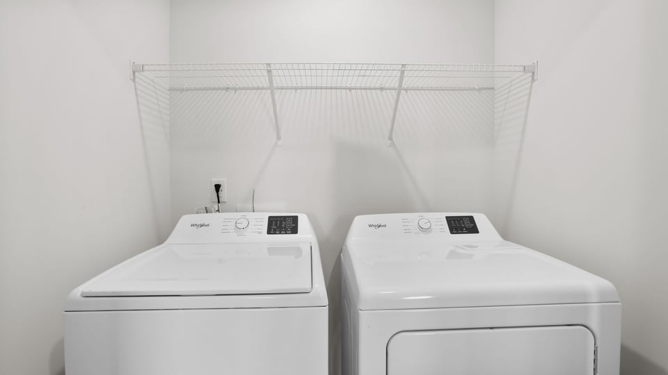 Walk in laundry room.