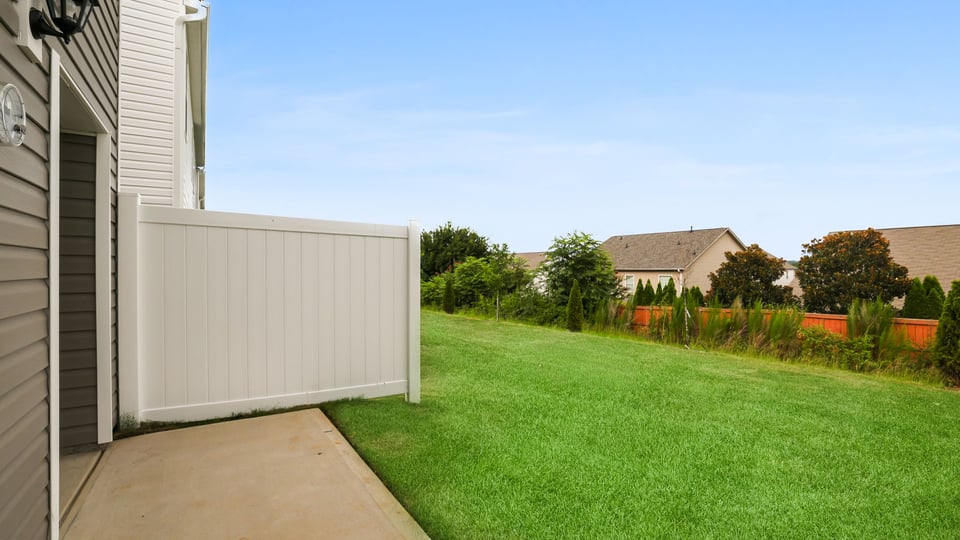 Large backyard of home.