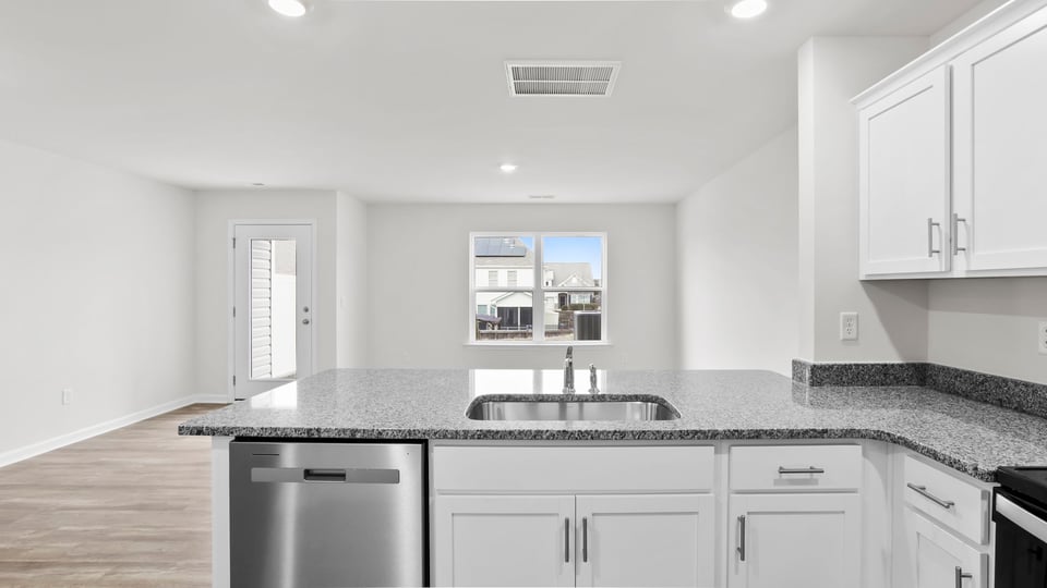 Kitchen with granite countertops.