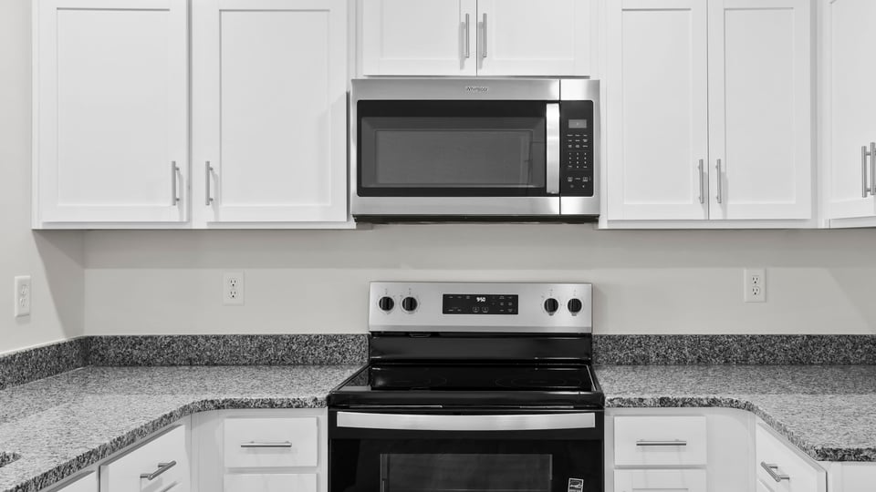 Kitchen with granite countertops.