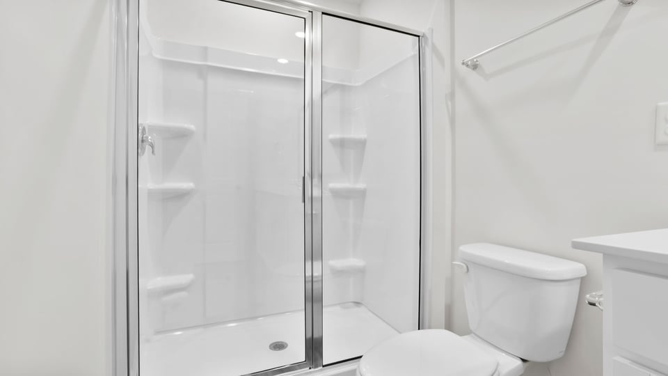 Bathroom with walk in shower.