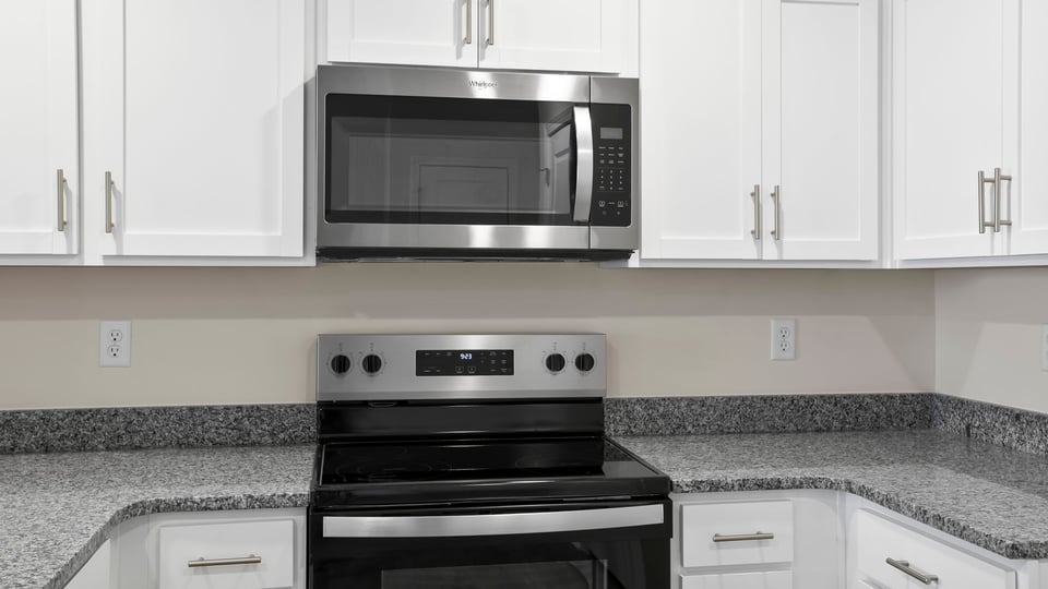 Kitchen with granite countertops.