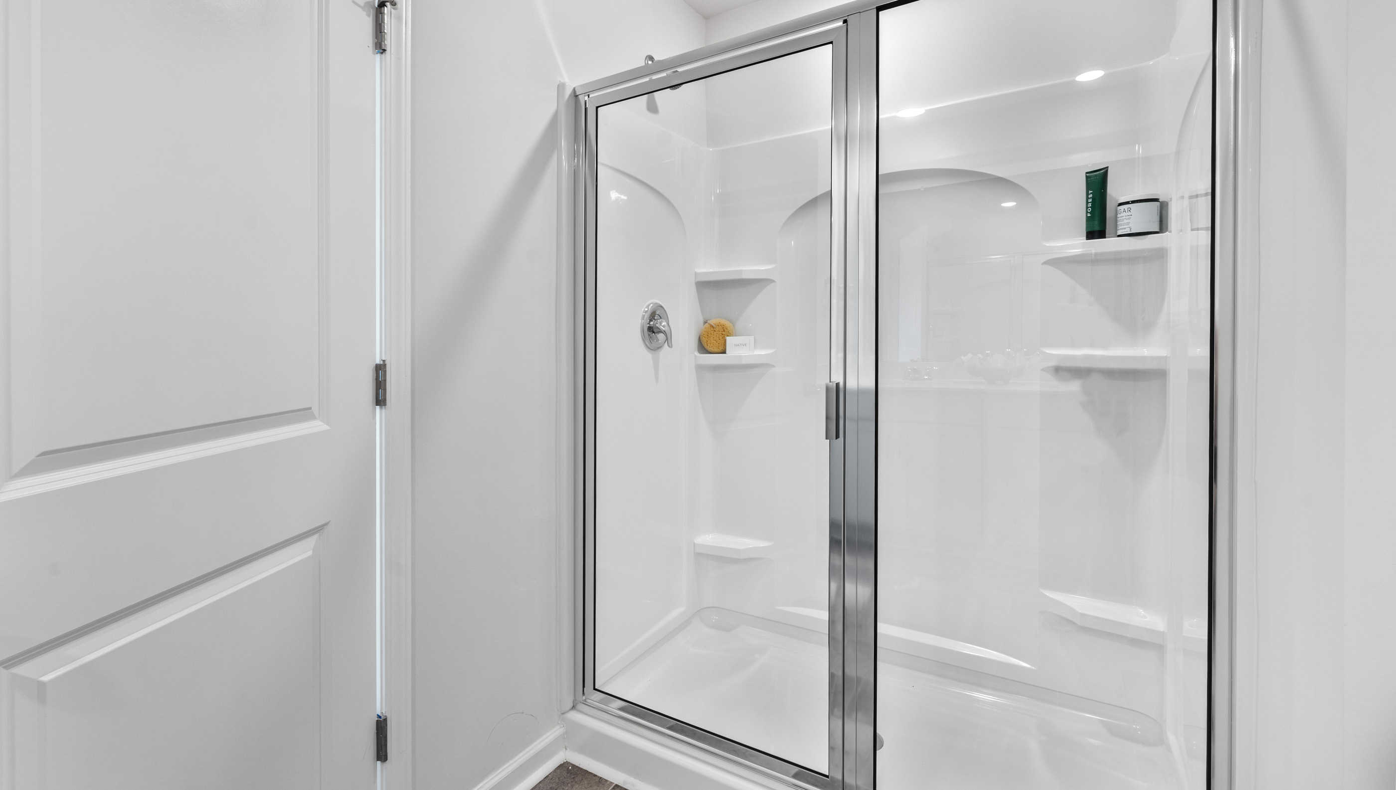 Primary bathroom with walk in shower.