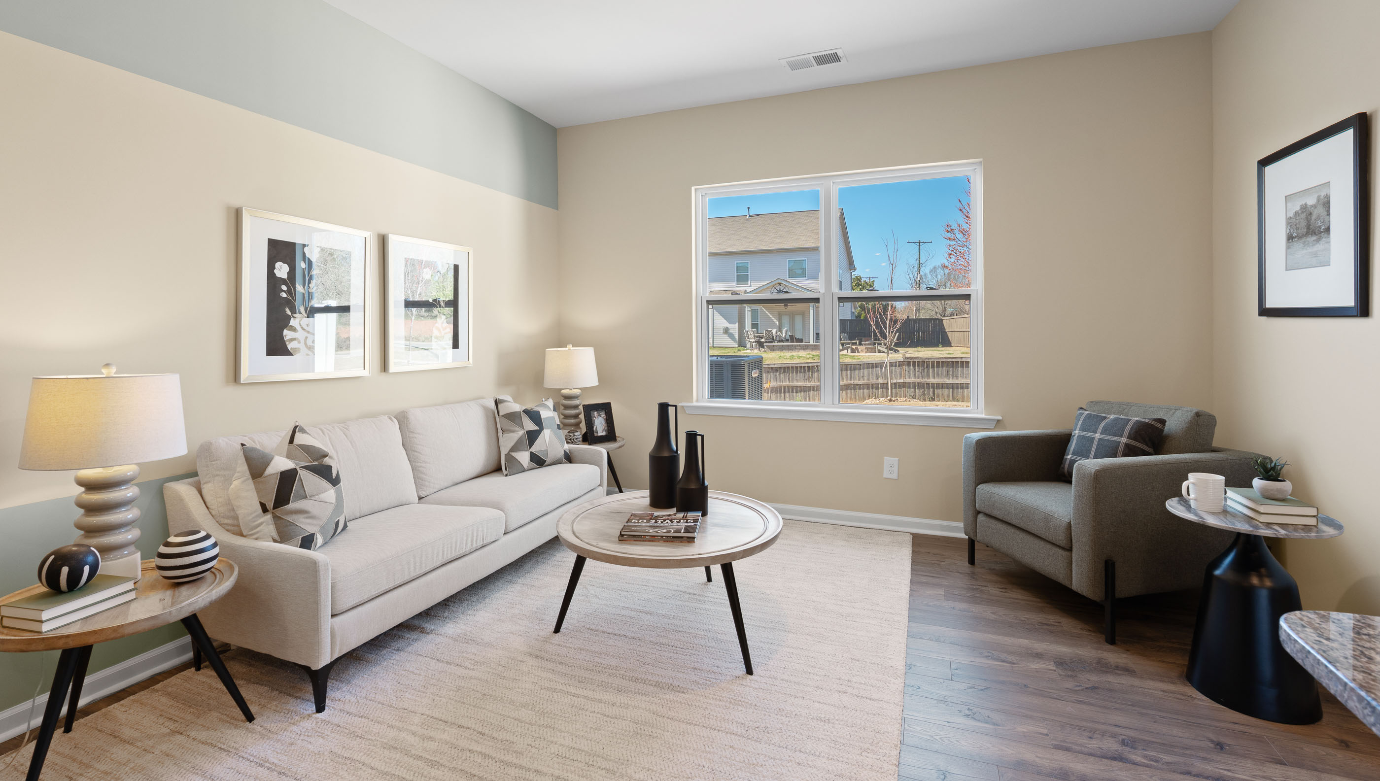 Livinging room with dining room view.